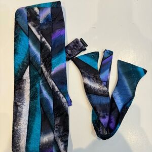 Silk Cummerbund with matching bow tie.